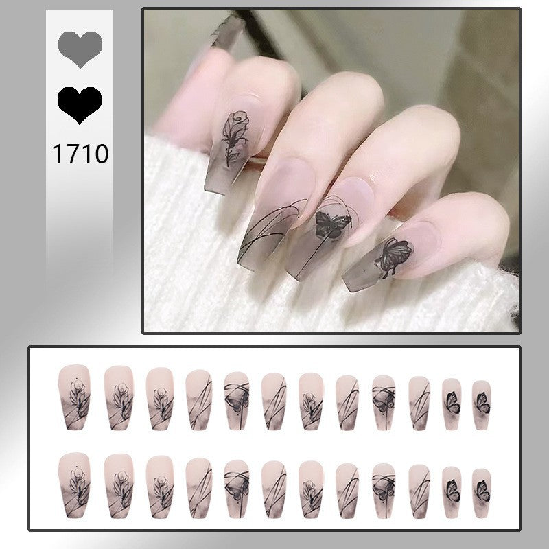 Kunstnagelset mit eleganten Blumendesign und filigranen Schmetterlingsmotiven Brehn