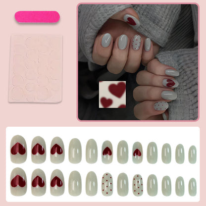 Kunstnagelset mit romantischen Herz- und Punktmotiven Brehn