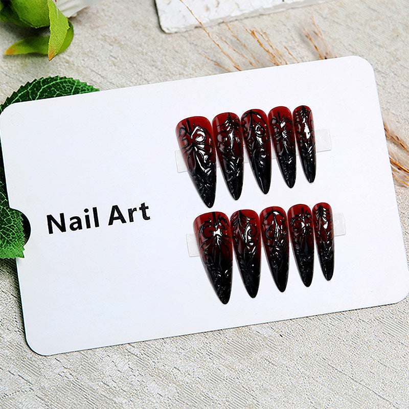 Kunstnägel mit elegantem Gothic-Muster Brehn