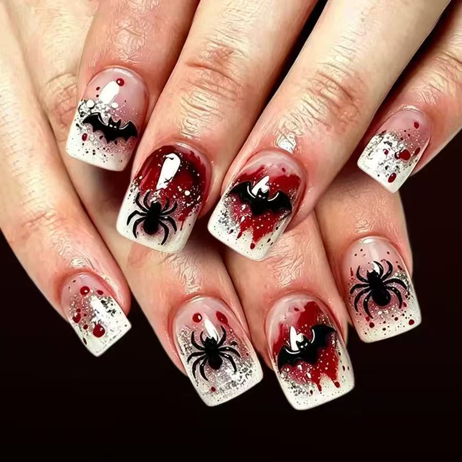 Halloween Kunstnagelset mit stilvollen Spinnennetz- und Vampirdesigns Brehn