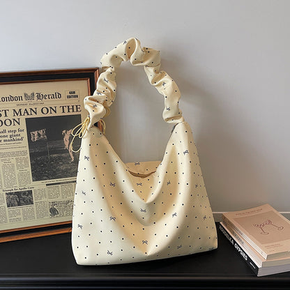Lässige gepunktete schlabberige Handtasche