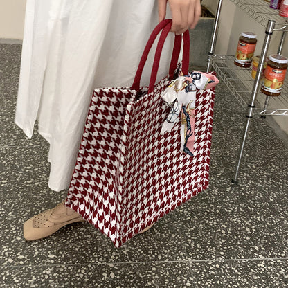 Elegante Houndstooth-Handtasche mit dekorativem Schleife