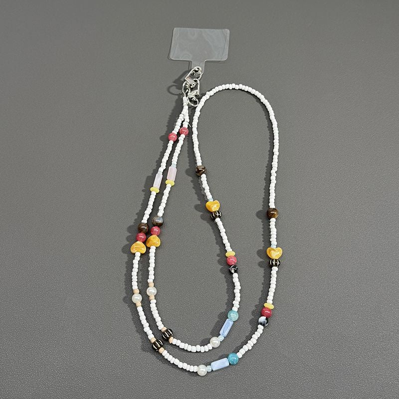 Perlenbrille Kette mit Schmetterlingsakzenten Brehn