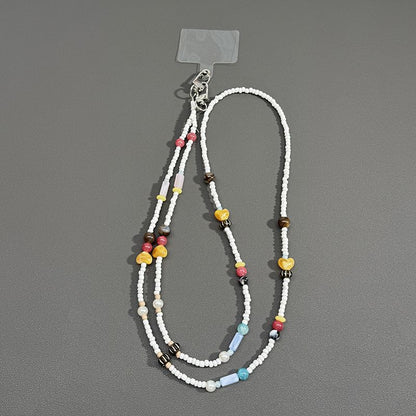 Perlenbrille Kette mit Schmetterlingsakzenten Brehn