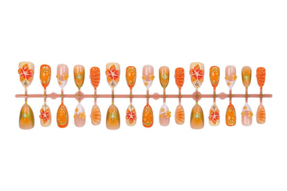 Kunstnagelset mit fröhlichen Blüten- und Glitzerdetails Brehn