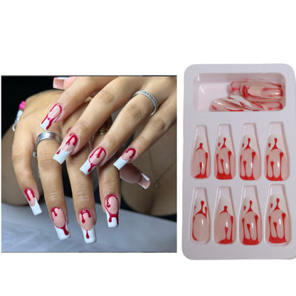Künstlerisches Press-On Nageldesign mit Tropfeneffekt Brehn