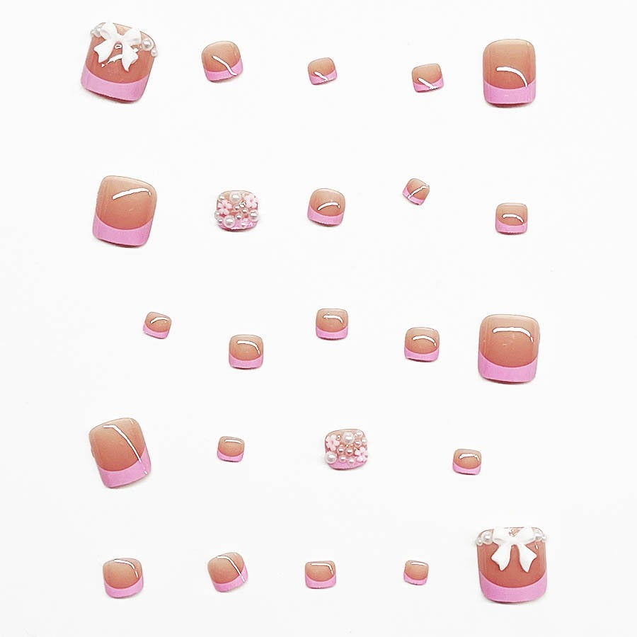 Dekorativer Press-On Nagelkunst Set mit floralen und Schleifenakzenten Brehn