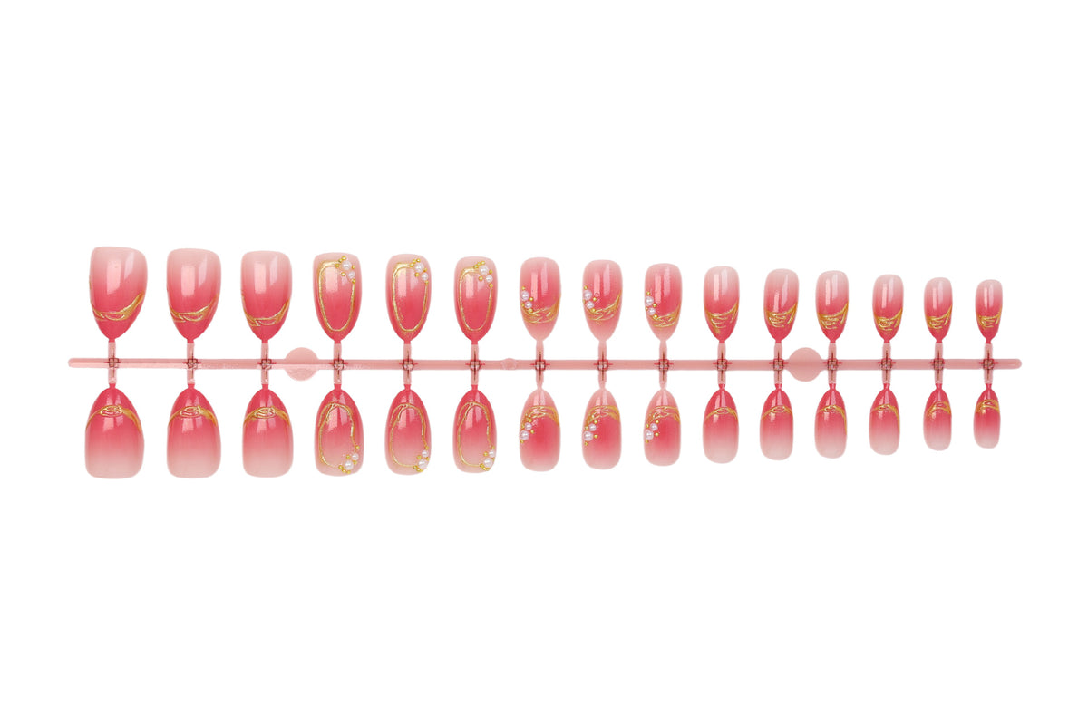 Kunstnagelset mit eleganten Ombré-Designs und Glitzerakzenten Brehn