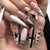 Kunstnagelset mit elegantem Sternen- und Glitzerdesign Brehn