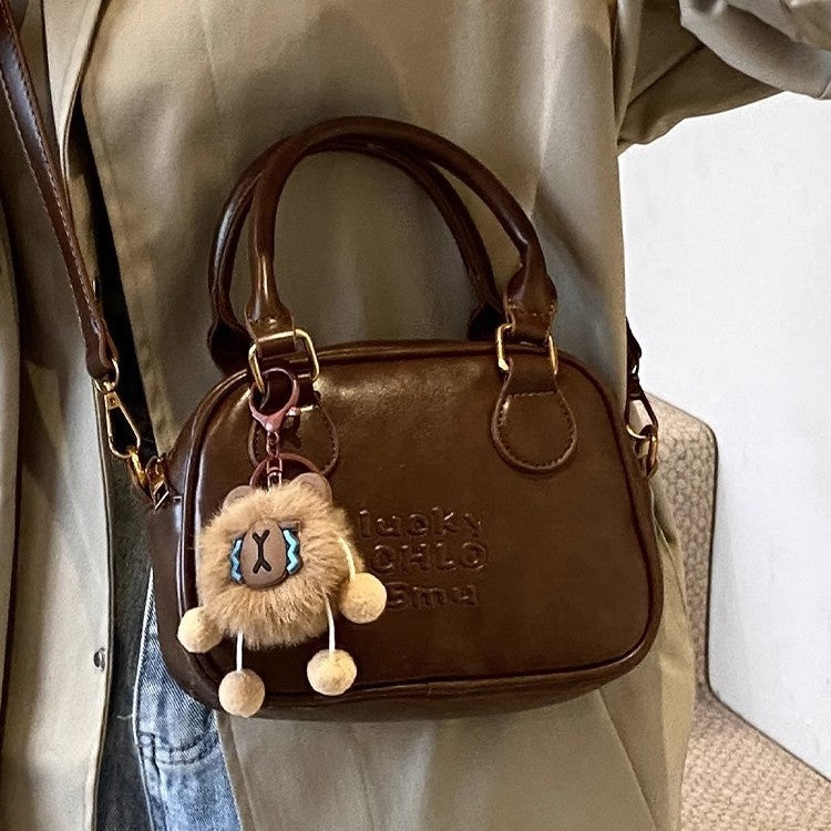 Schlanke strukturierte Mini-Schultertasche Brehn