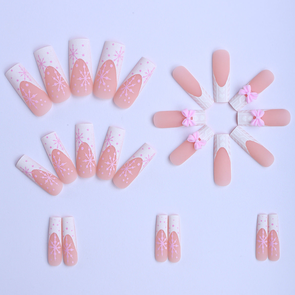 Künstliche Nagelspitzen mit Verspielten Schleifen und Schneeflocken Design Brehn