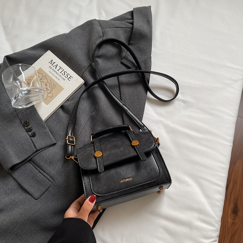 Kompakte Lederhandtasche Brehn