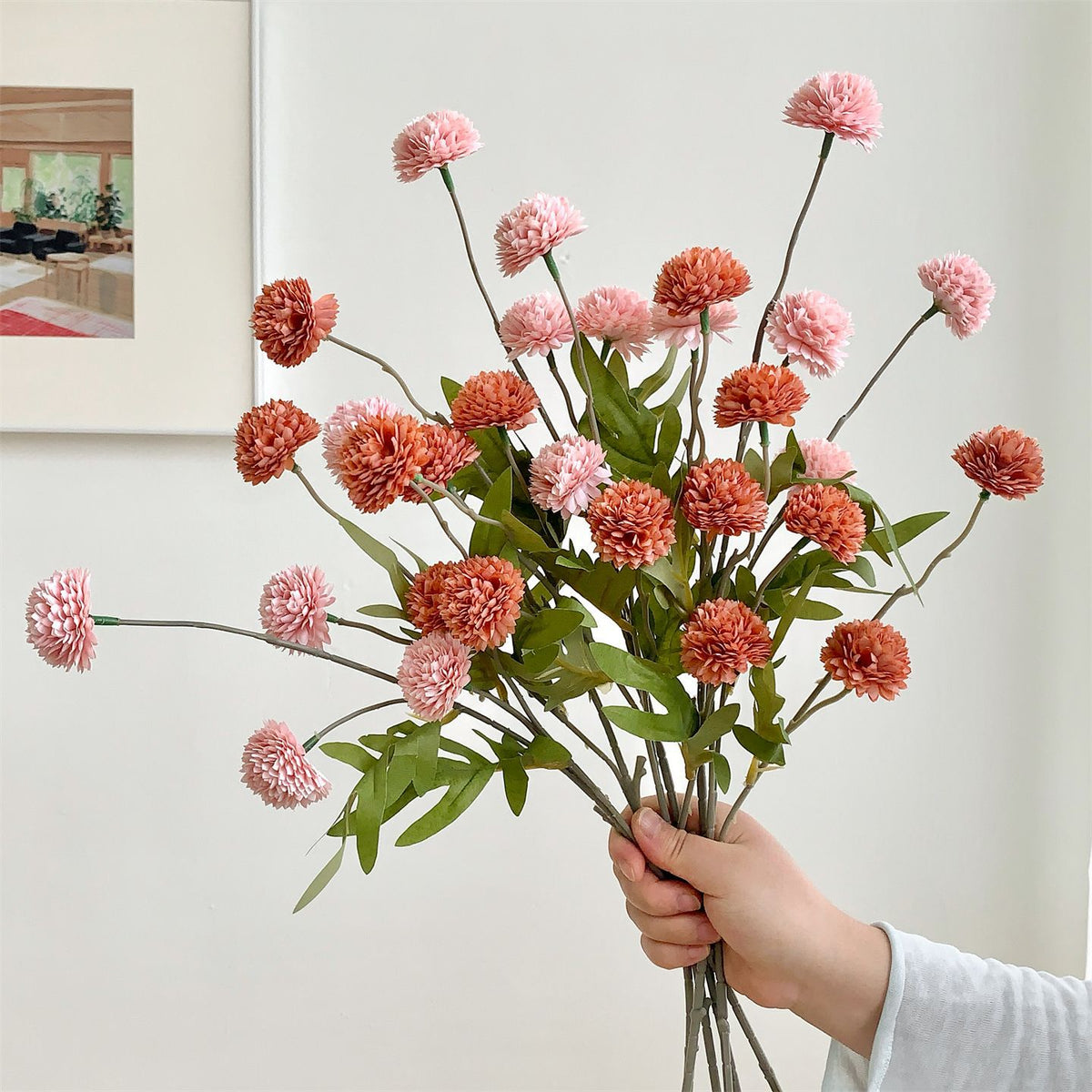 Dekorativer Blumenspross für die Wohnkultur-Darstellung