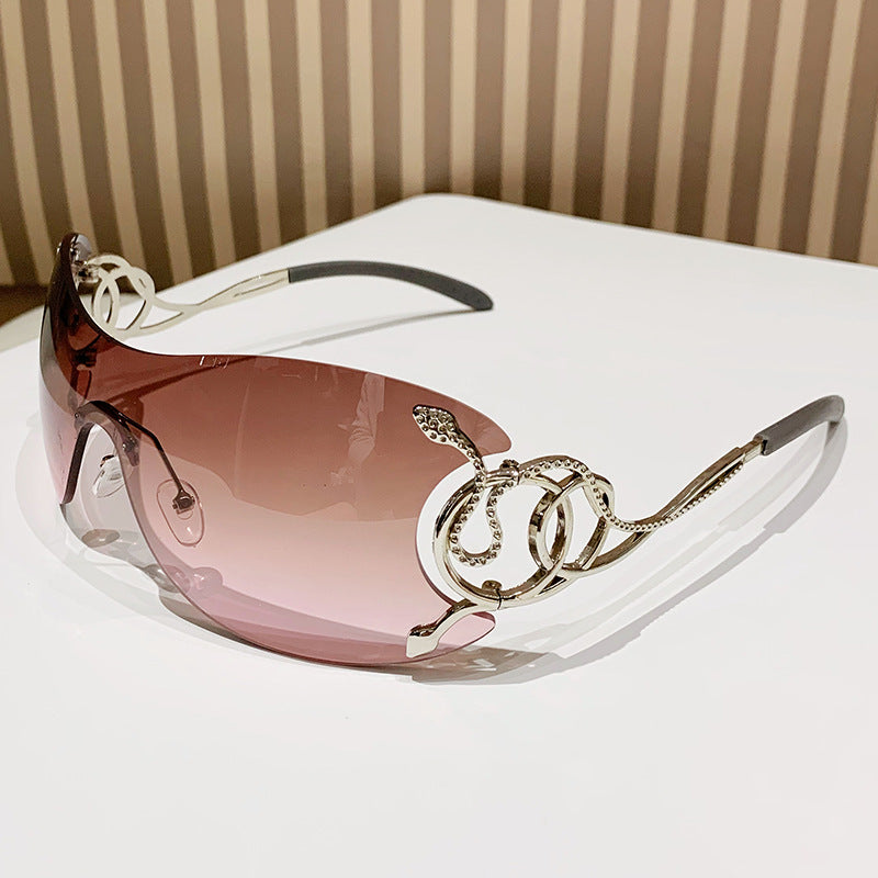 Damen futuristische Sonnenbrille mit verspieltem Design Brehn
