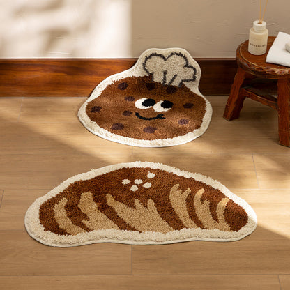 Badezimmer‑Badematten‑Set Brehn mit handgetuftetem Keks- und Brot‑Design, weichem Mikrofaser‑Flor und rutschfester Gummiunterseite