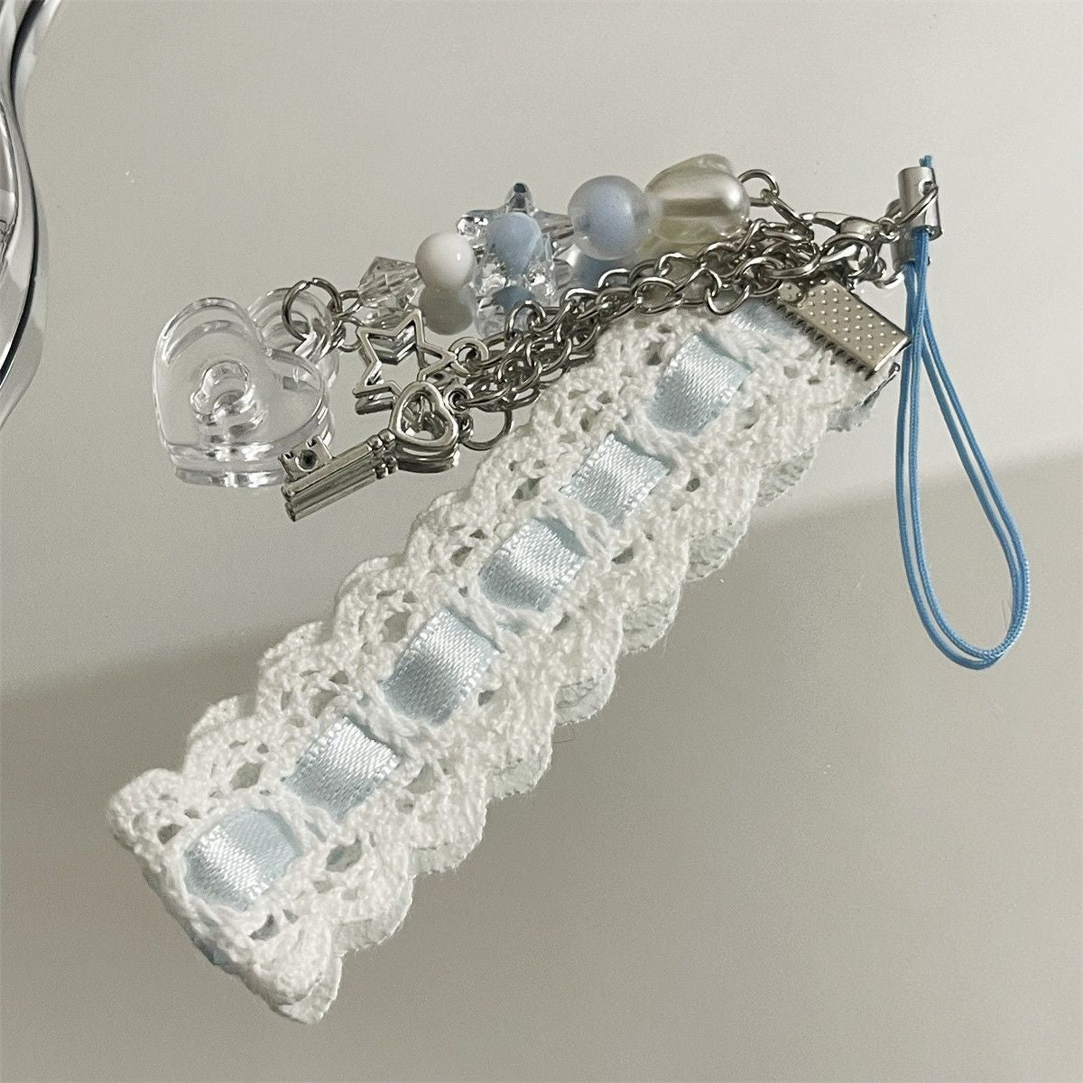 Dekorativer Handy Charm Halter Brehn