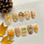 Herbst-inspirierte Press-On Nagelkunst Set Brehn
