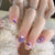 Kreatives Nail Art Set mit bunten Regenbogen- und Wolkenmotiven Brehn