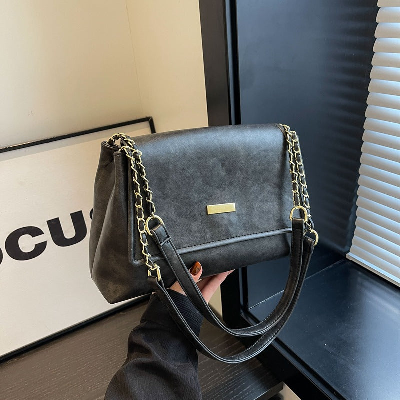 Kettengriff Handtasche