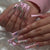 Kunstnagelset mit eleganten Glitzer- und Strassakzenten Brehn