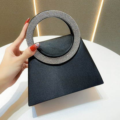 Elegante Handtasche mit Strassgriffen