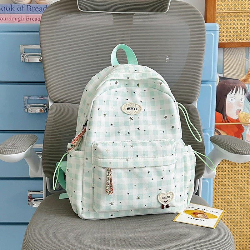 Süßer gemusterter Schulrucksack