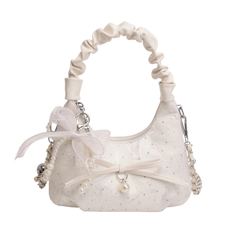 Elegante Schultertasche mit Schleifenverzierung