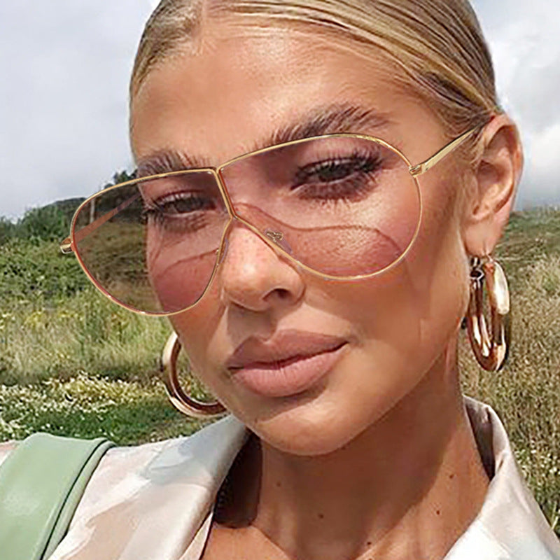 Damen Pilotensonnenbrille mit elegantem goldenen Rahmen und blauen Gläsern Brehn