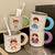 Keramiktasse mit Fröhlichem Familienmotiv Brehn