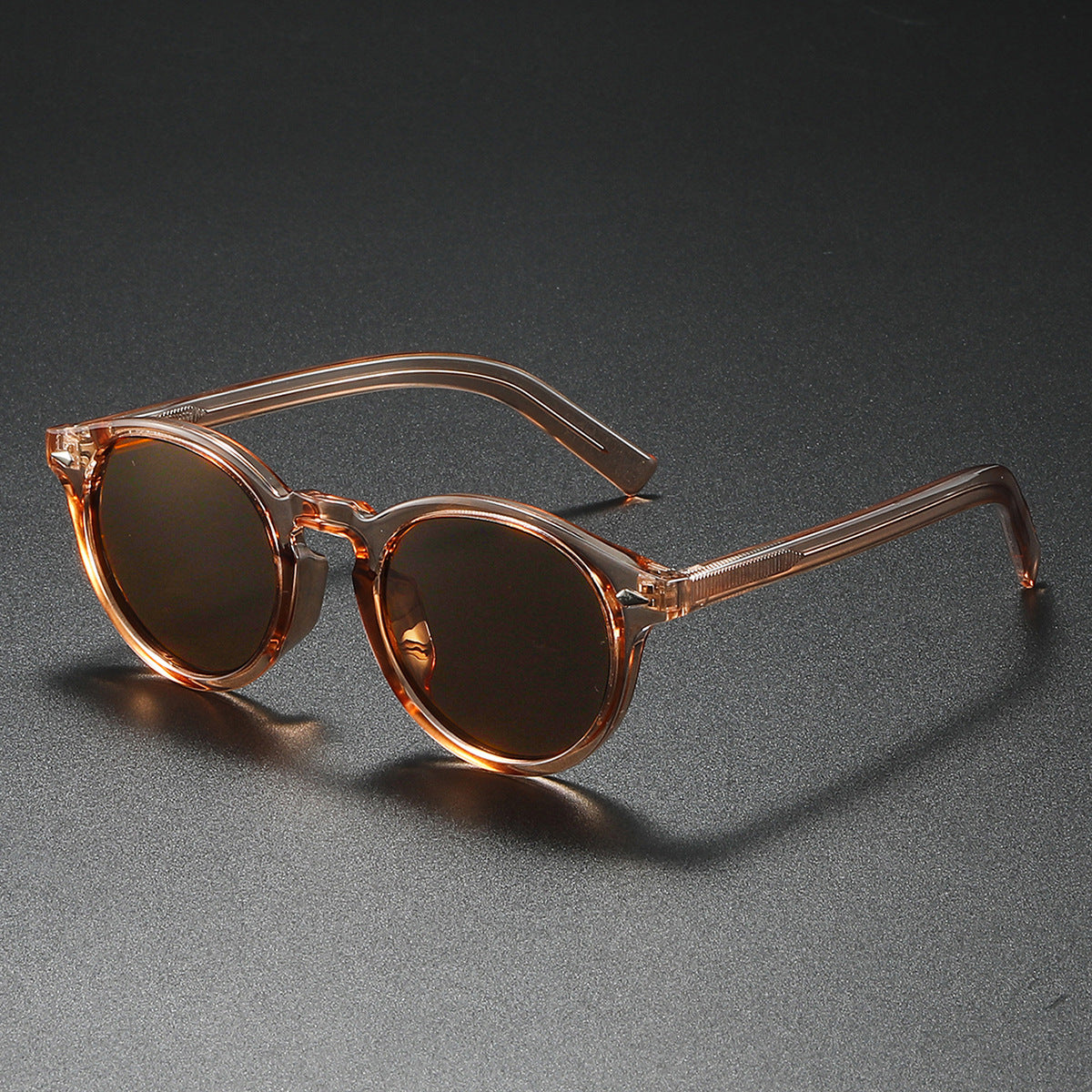 Damen Rund-Sonnenbrille mit transparentem Rahmen und reflektierenden Gläsern Brehn