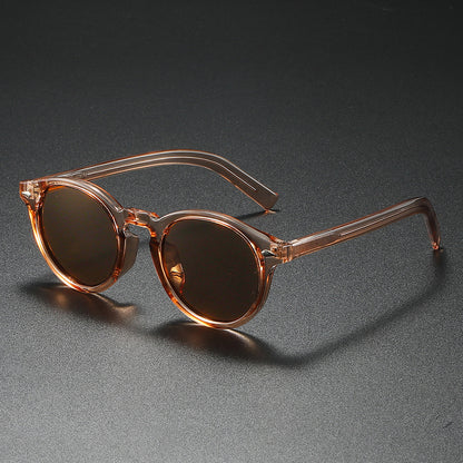 Damen Rund-Sonnenbrille mit transparentem Rahmen und reflektierenden Gläsern Brehn