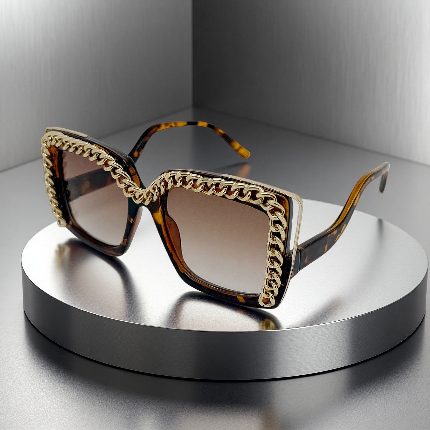 Damen modische oversized Sonnenbrille mit Kettenrahmen Brehn