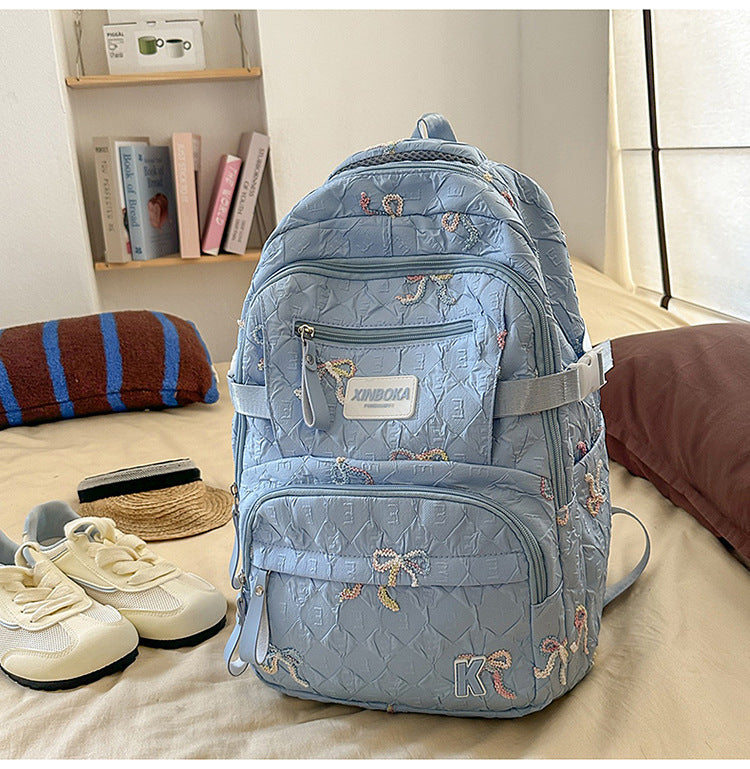 Dekorativer verziierter gesteppten Schulrucksack