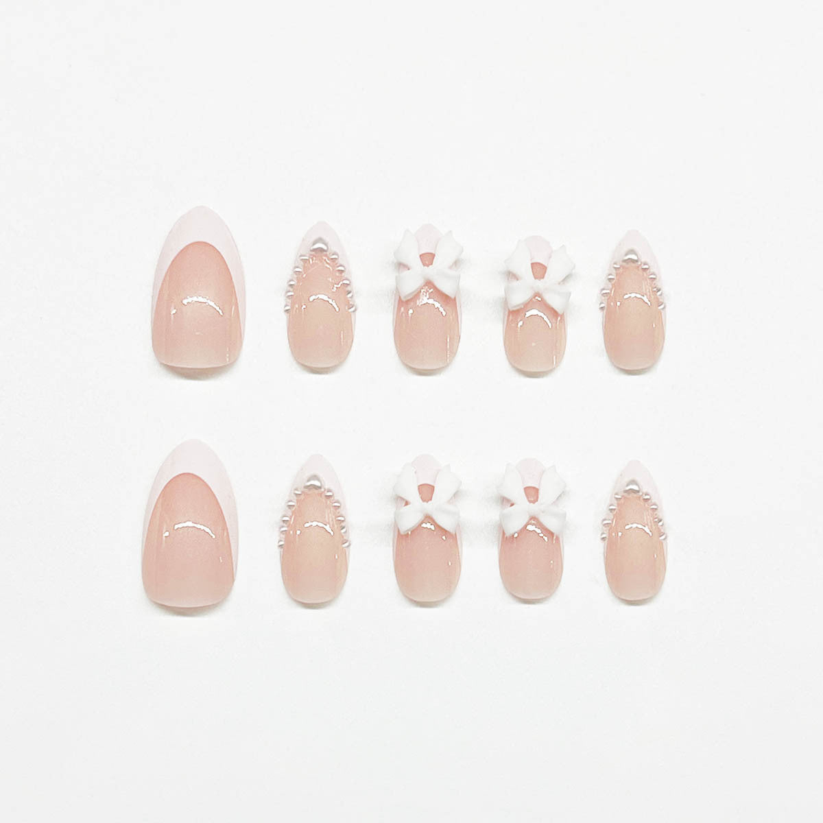 Elegante mit Schleifen verzierten Acryl-Nagelerweiterungen Brehn