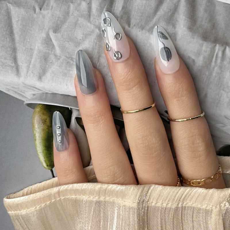 Künstlerisches Stiletto Presse-auf-Nageldesign mit zeitgenössischen Akzenten Brehn