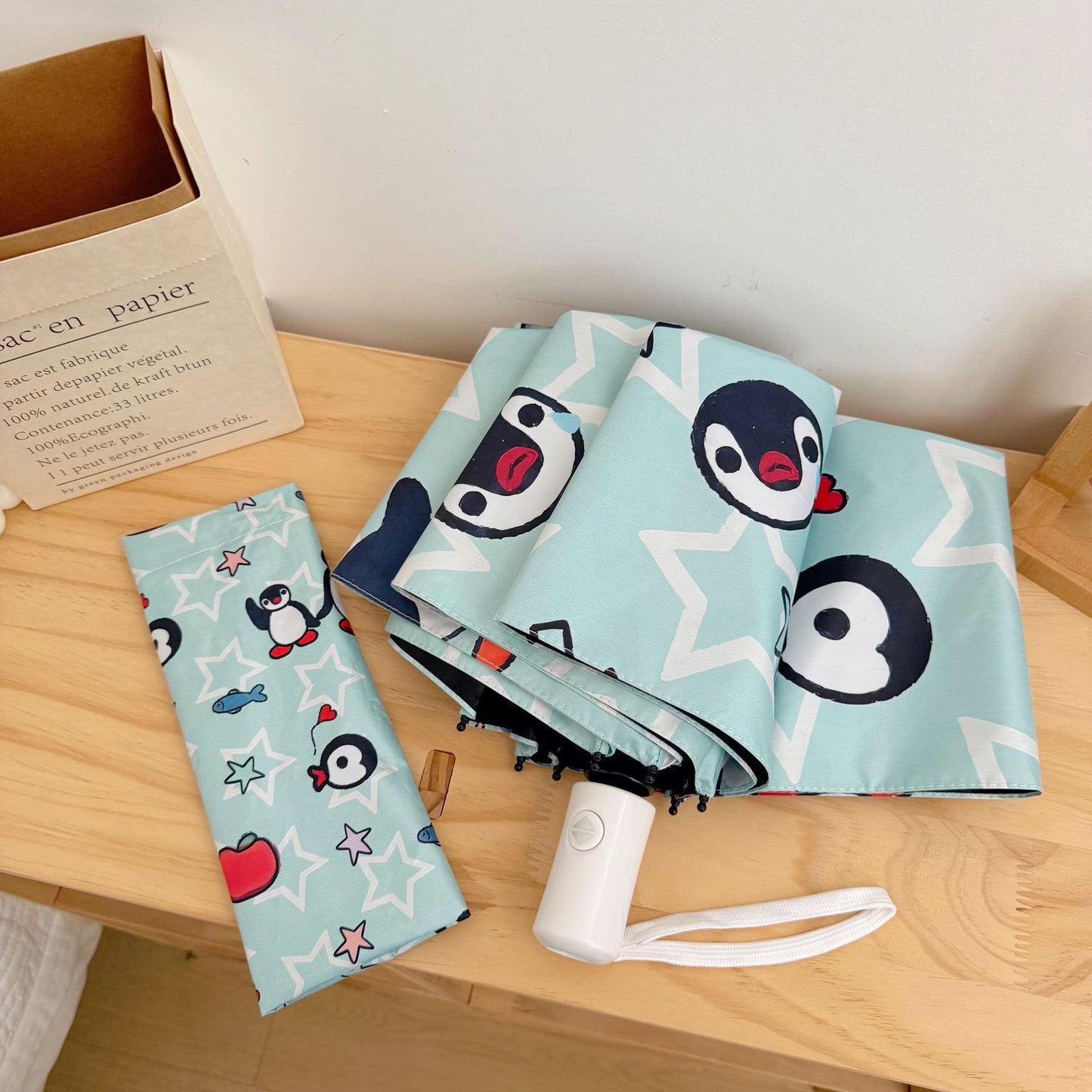 Damen faltbarer Regenschirm mit verspieltem Pinguin-Design Brehn
