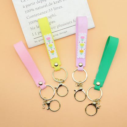Unisex Schlüsselanhänger aus strapazierfähigem Silikon mit verspieltem Design Brehn