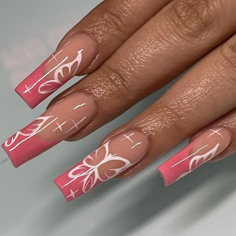 Kunstvolle Stiletto-Nägel mit buntem Schmetterlingsdesign Brehn