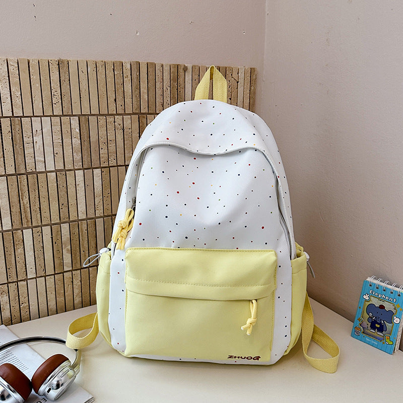 Lustiger gepunkteter Schulrucksack