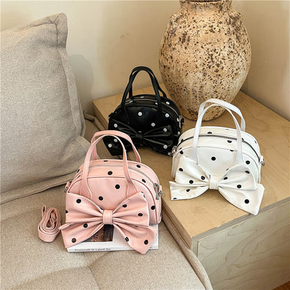 Schleifenverzierte Handtasche