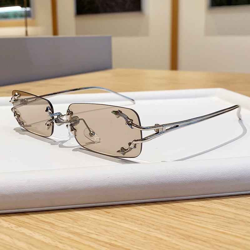 Damen modische Sonnenbrille mit filigranem Metallrahmen und transparenten Gläsern Brehn