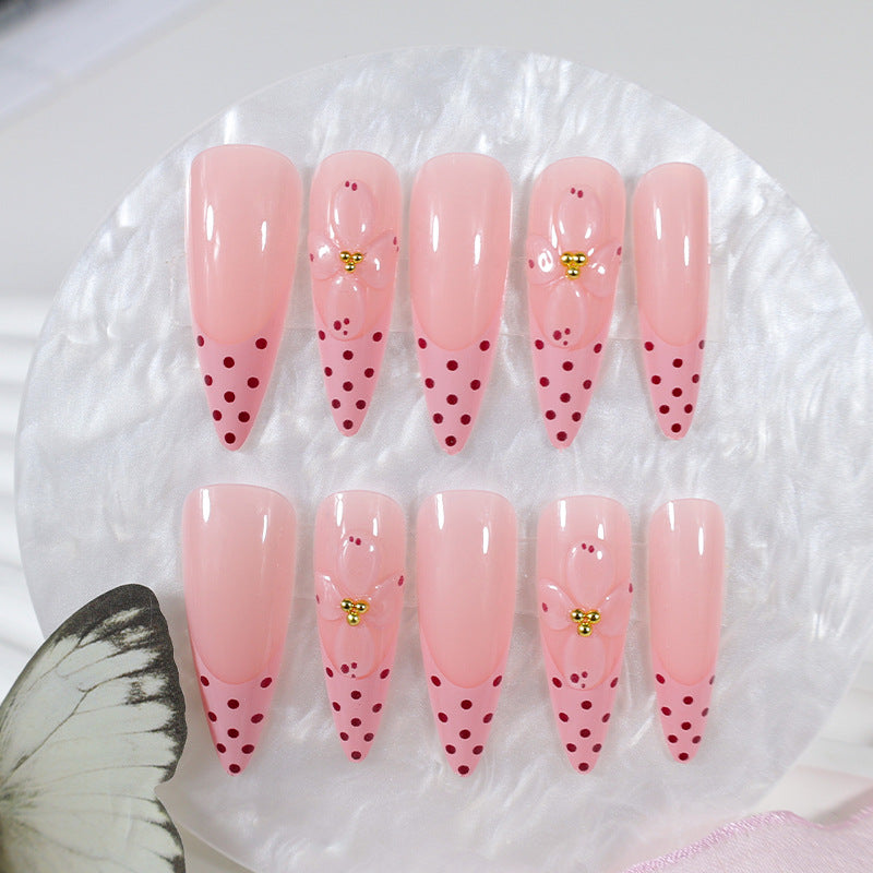 Kunstnagelset mit romantischen Blumen- und Punktemotiven Brehn