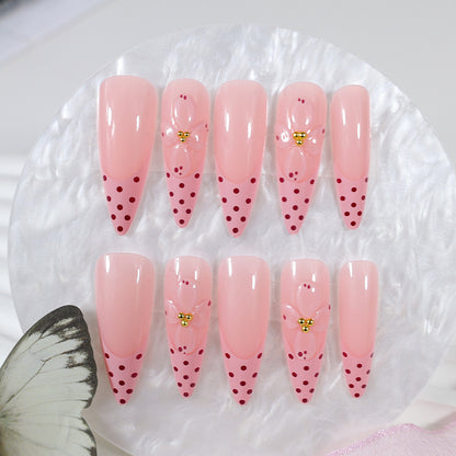 Kunstnagelset mit romantischen Blumen- und Punktemotiven Brehn