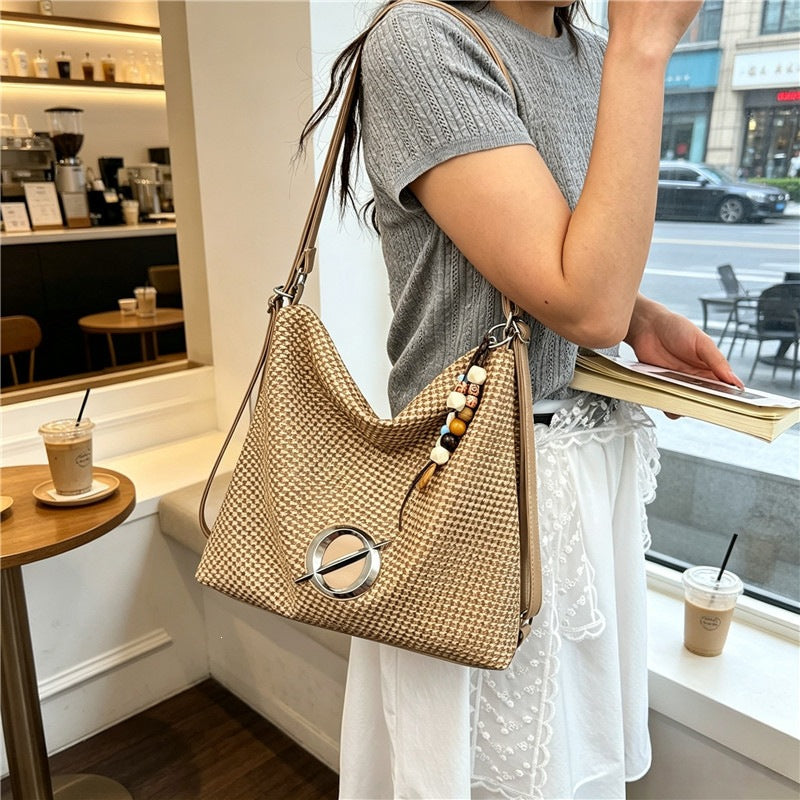 Strukturierte Hahnentrittschultertasche