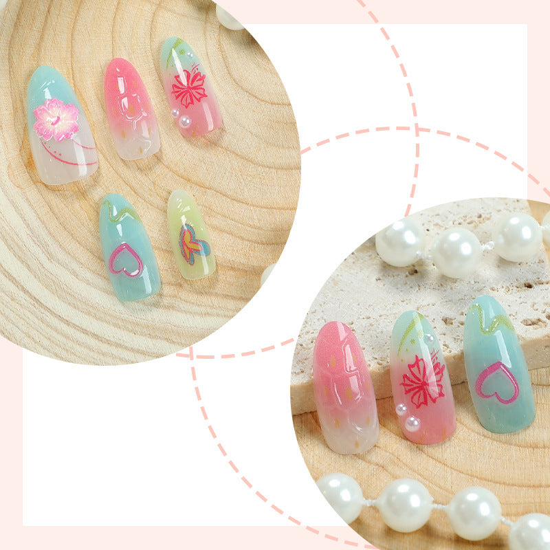 kreatives Kunstnagelset mit maritimen Motiven und funkelnden Akzenten Brehn