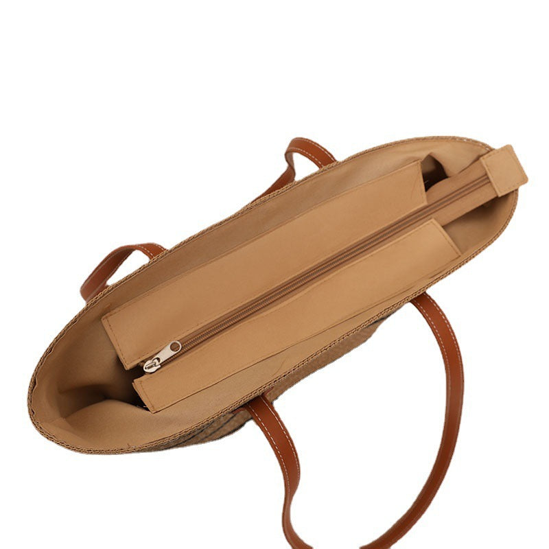 Elegante Bast-Handtasche mit Ledergriffen Brehn