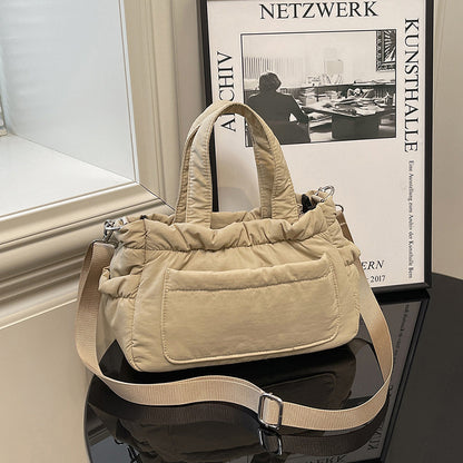 Gepolsterte Utility-Handtasche