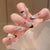 Kunstnagelset mit elegantem Schwarz-Weiß-Design und funkelnden Applikationen Brehn