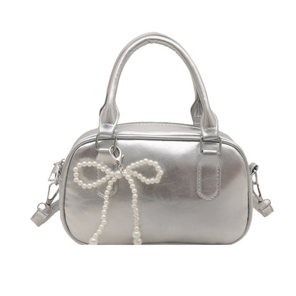 Elegante perlenverzierte Handtasche