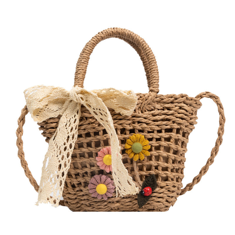 Verspielte Korbtasche mit Floralen Applikationen Brehn